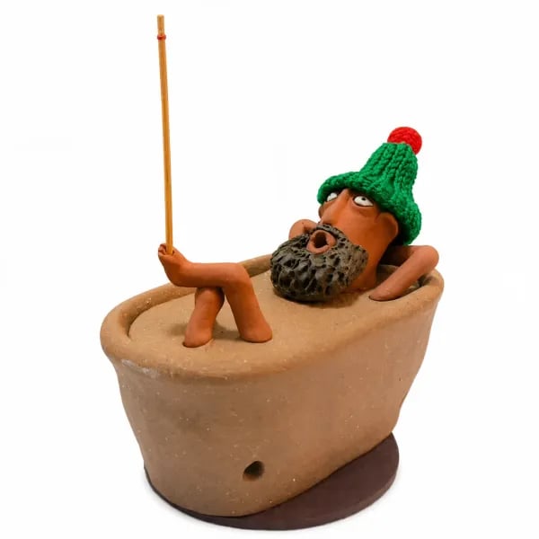 Bath Man incense holder on a white background